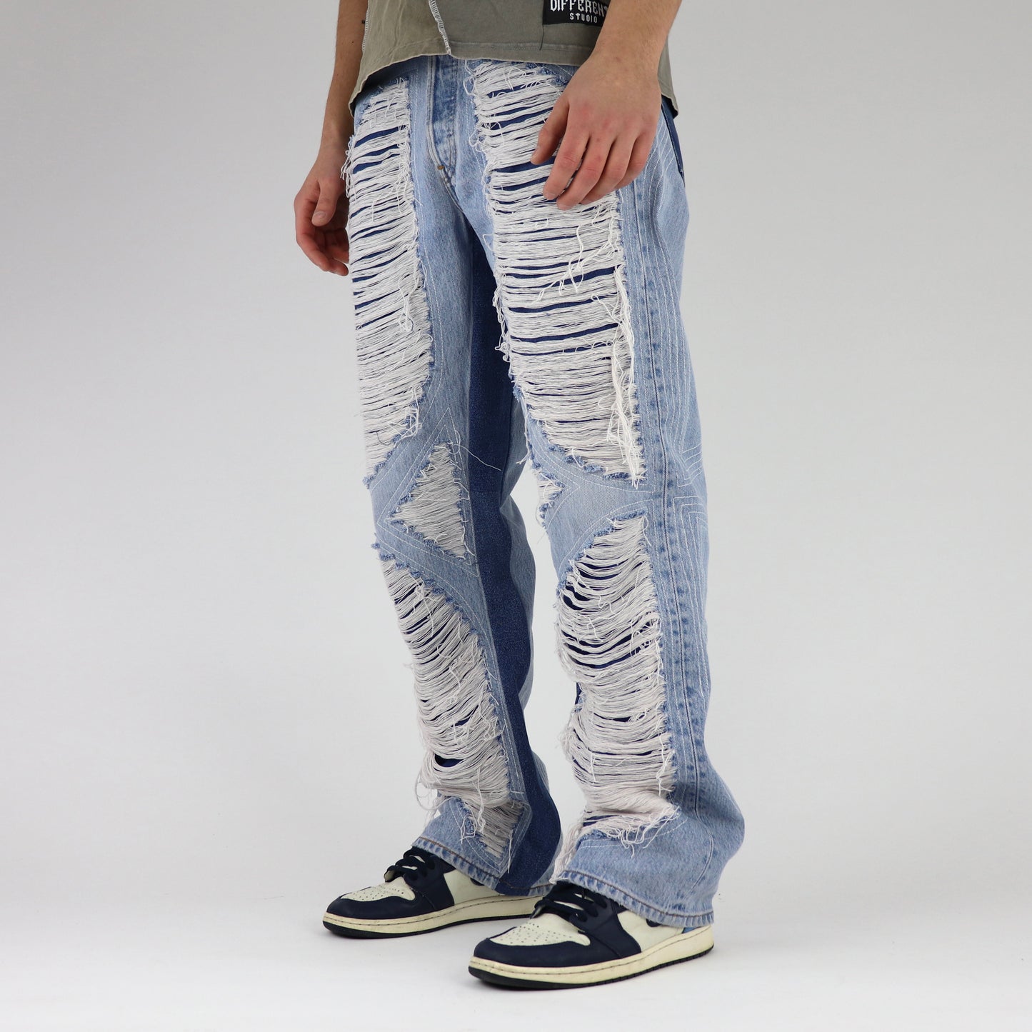 Symmetrical distressed jeans