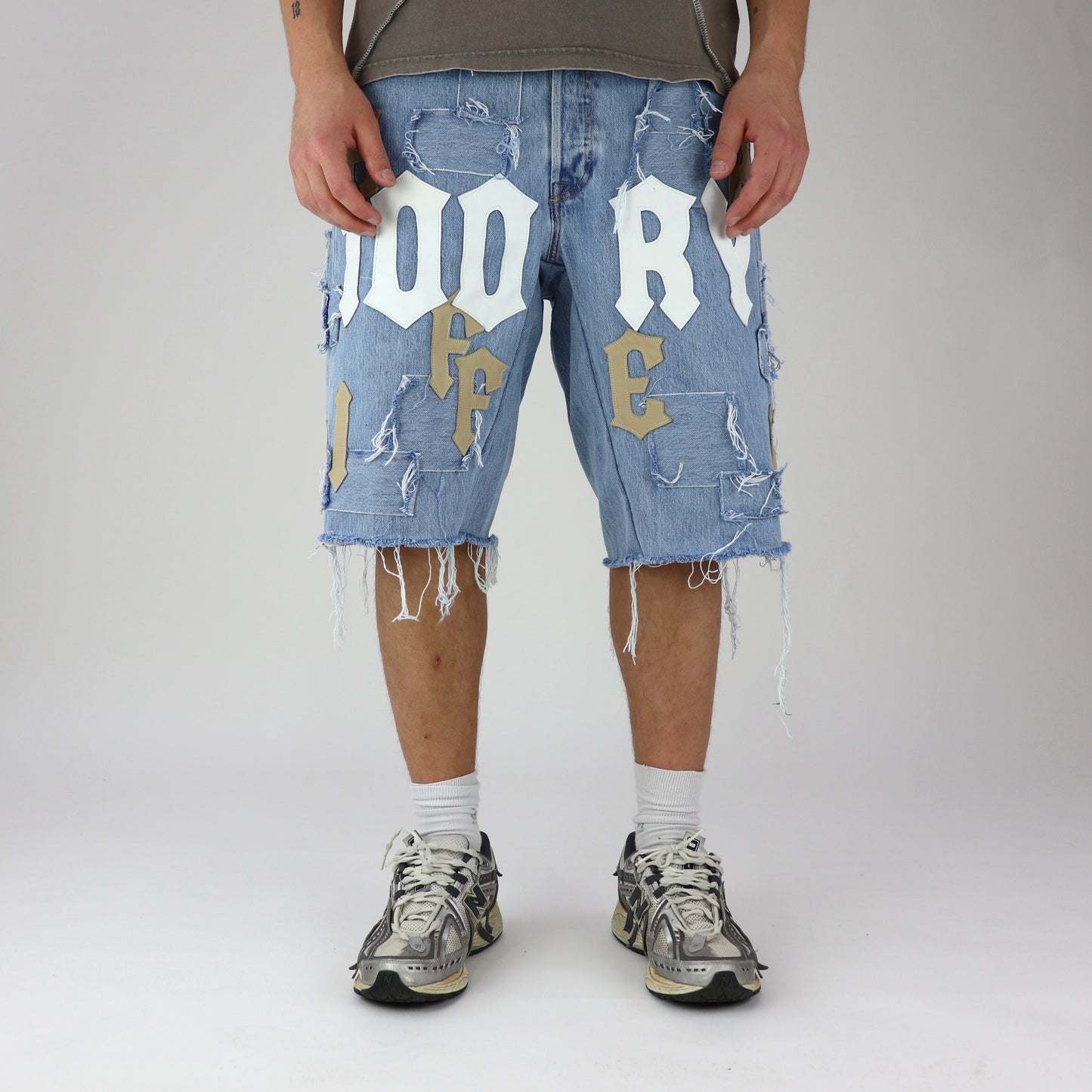DFFRNT 100RY letters blue shorts