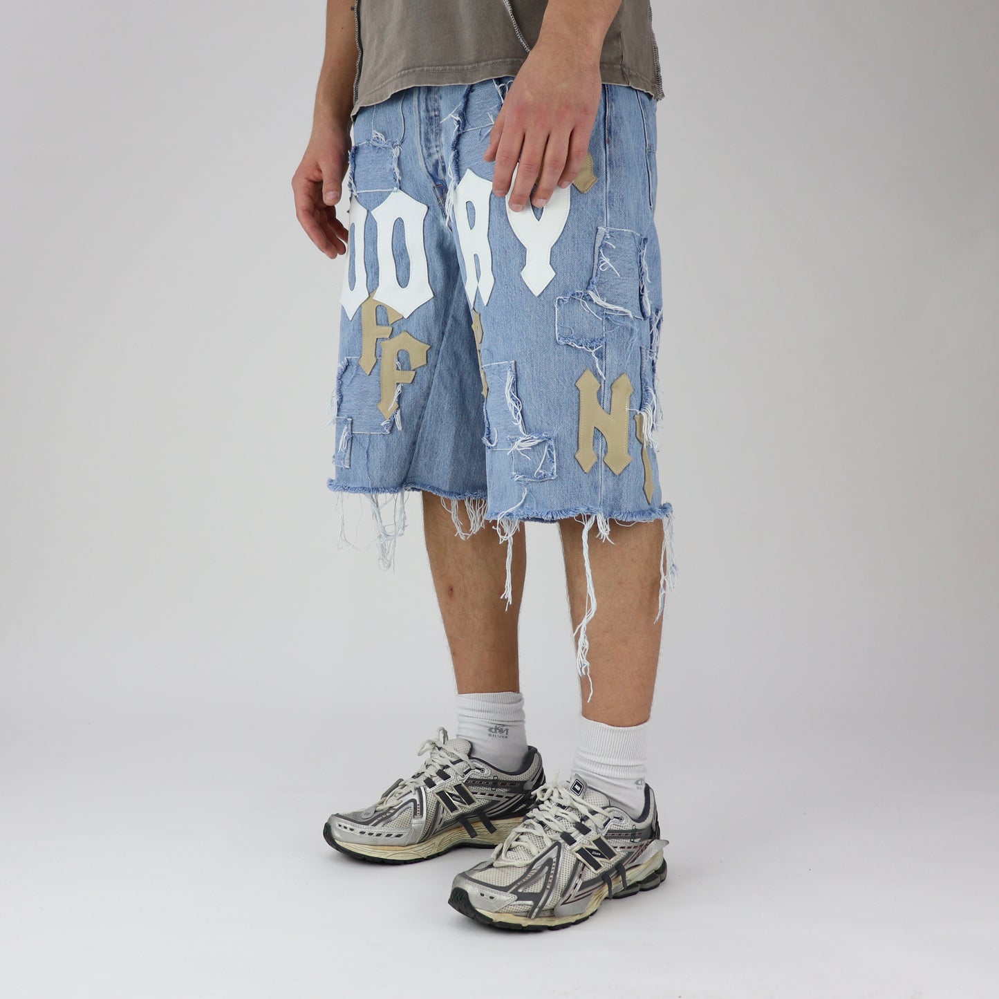 DFFRNT 100RY letters blue shorts