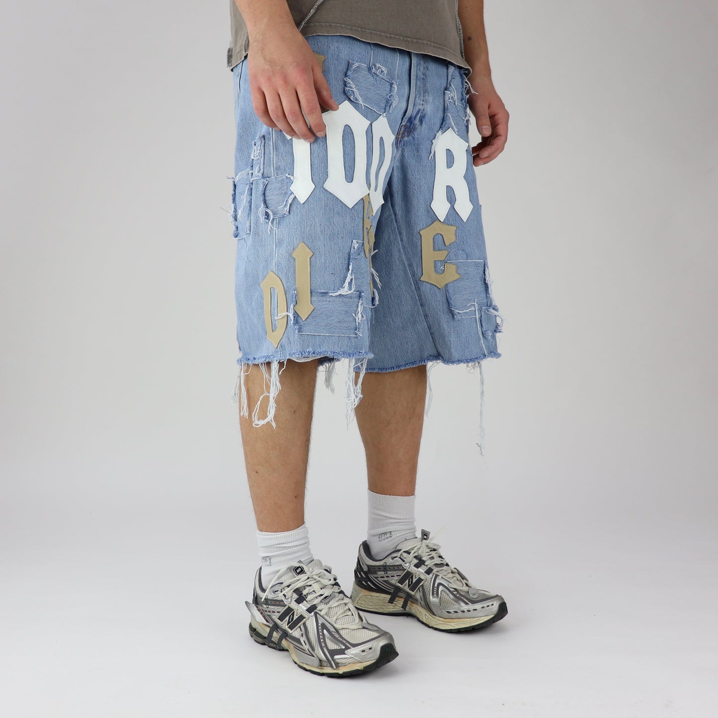 DFFRNT 100RY letters blue shorts